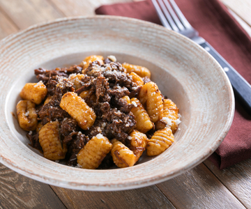 Cornmeal gnocchi with venison ragu
