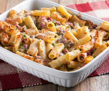 Baked pasta with sausage and peas