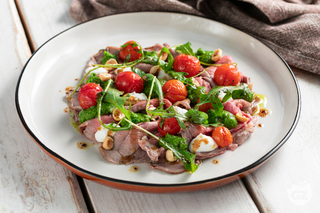Cold roast beef recipe with arugula pesto, roasted cherry tomatoes and goat cheese