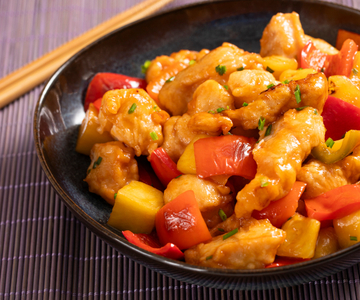 Sweet and sour chicken with peppers and pineapple
