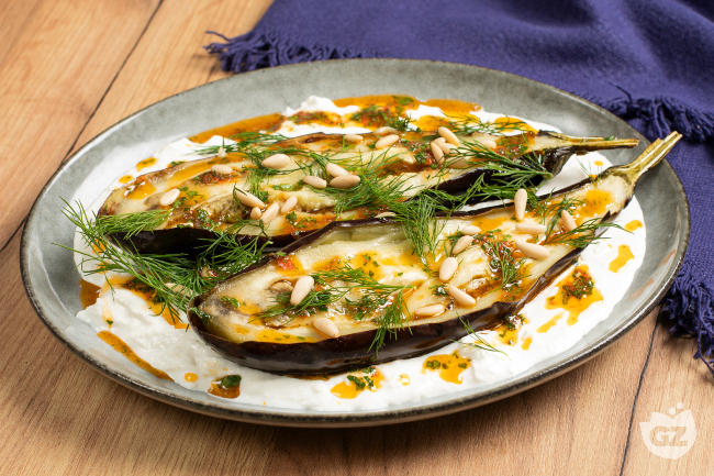 Oven-baked eggplant with burrata, pine nuts and spicy chili oil Oven-baked eggplant with burrata, pine nuts and spicy chili oil