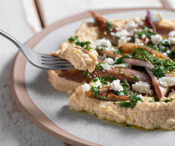 Pan-fried eggplant with hummus and feta
