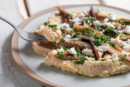 Pan-fried eggplant with hummus and feta